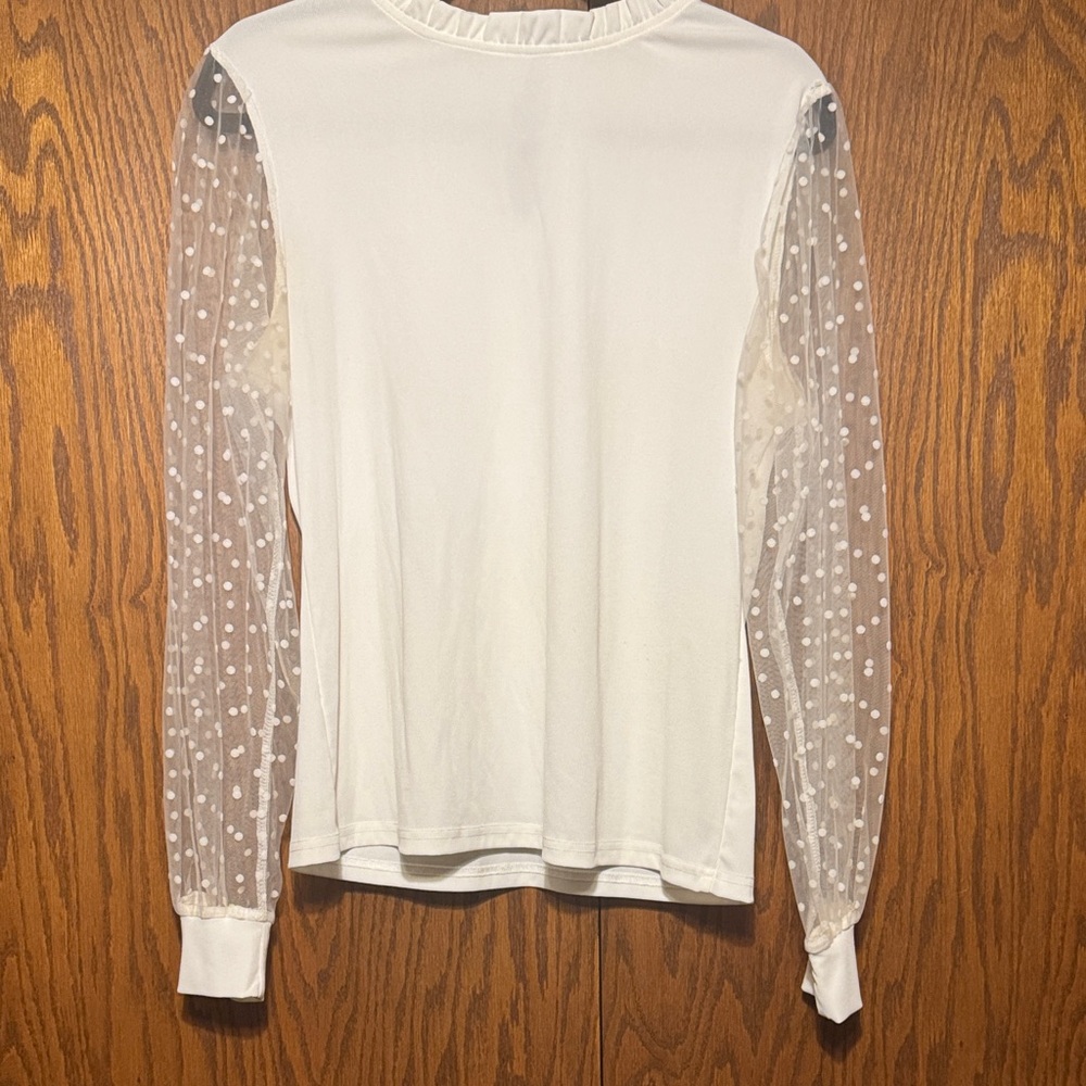Elegant White Top with Sheer Polka Dot Sleeves